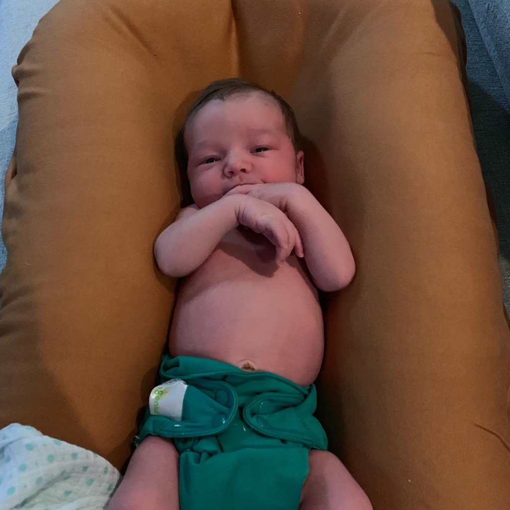 Weston at 1 1/2 weeks old, wearing the bumGenius Elemental Organic one-size cloth diaper in Hummingbird. He weighed under 8 lbs at this point and the tightest diaper setting fit him perfectly!